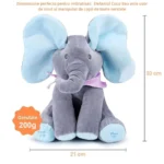 Elefant de pluș gri cu urechi albastre și eșarfă violet