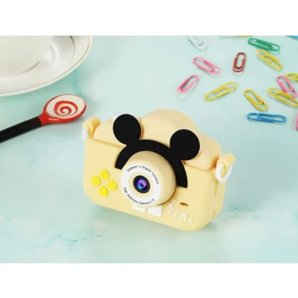 camera foto pentru copii impact visionĀ®, ecran hd ips, puzzle, jocuri, galben Aparat foto copii galben pe o masa albastra